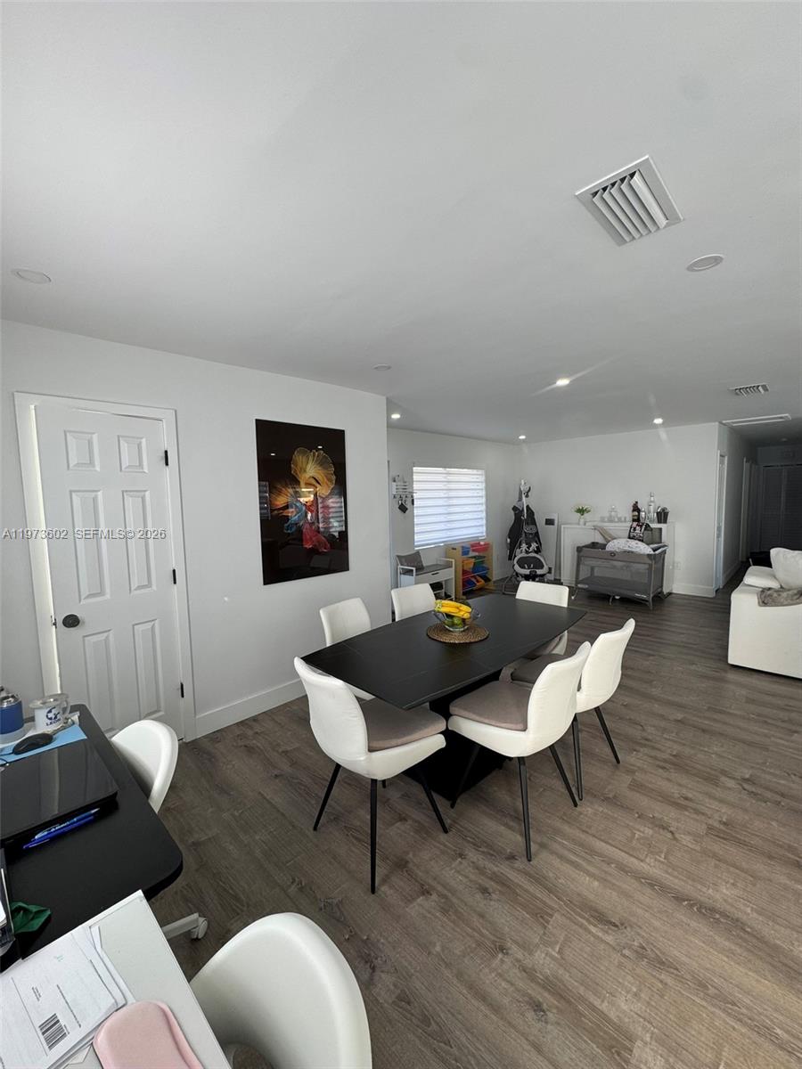 12534 Southwest 27th Street Miami, FL 33175 - Photo 15 of 49 a living room with furniture a rug and a table
