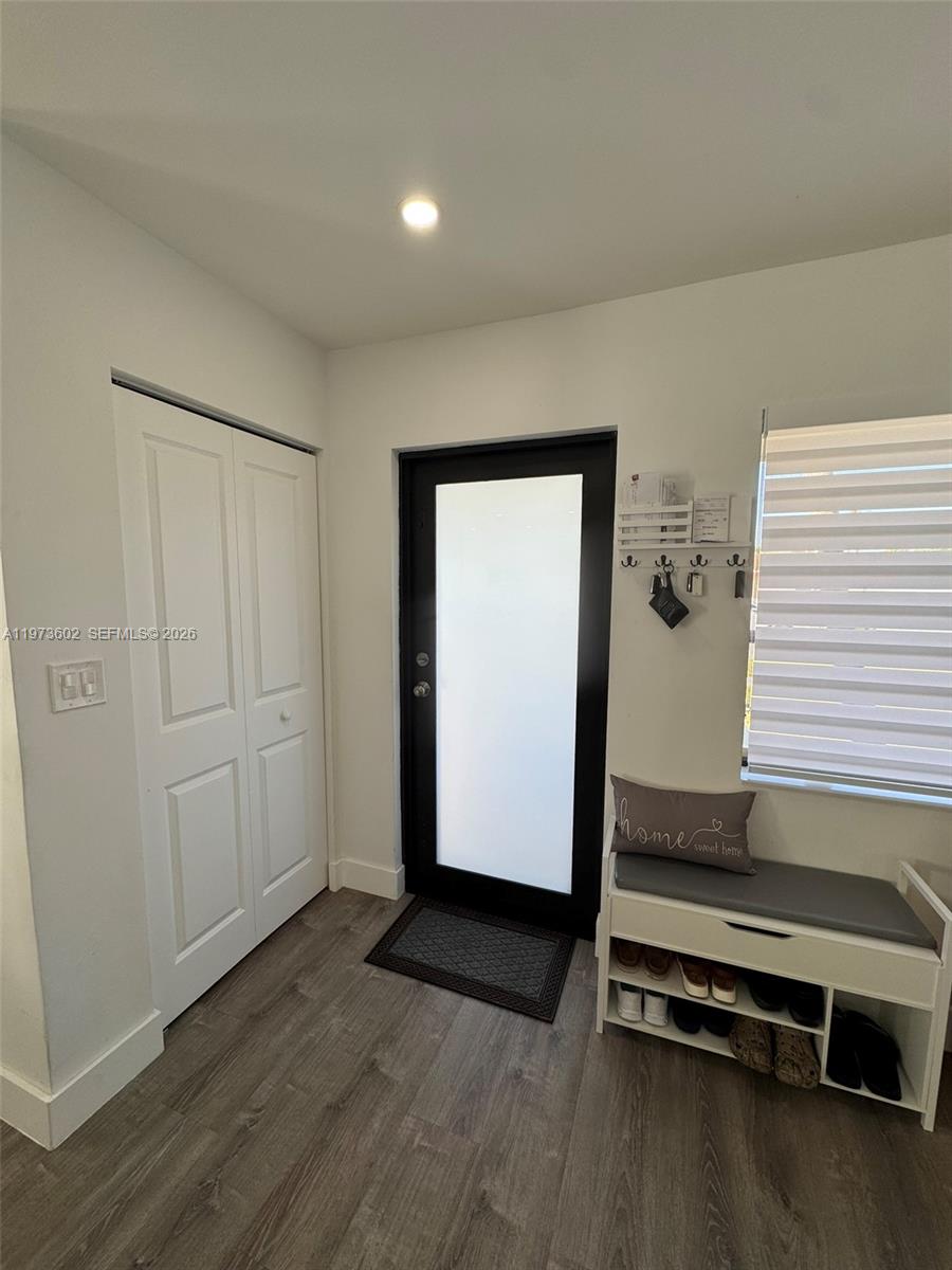 12534 Southwest 27th Street Miami, FL 33175 - Photo 3 of 49 a view of a room with wooden floor