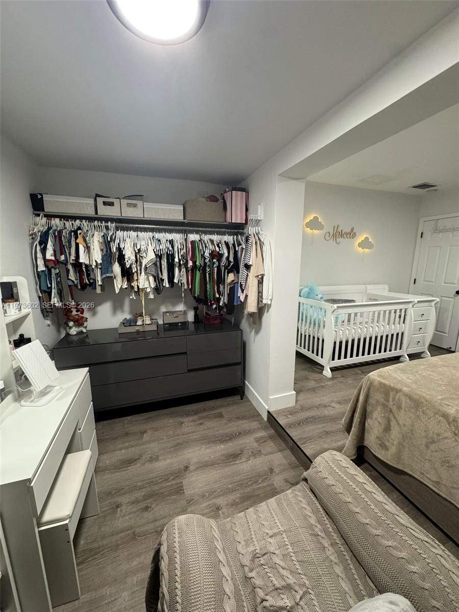 12534 Southwest 27th Street Miami, FL 33175 - Photo 46 of 49 a view of a hallway with a bed