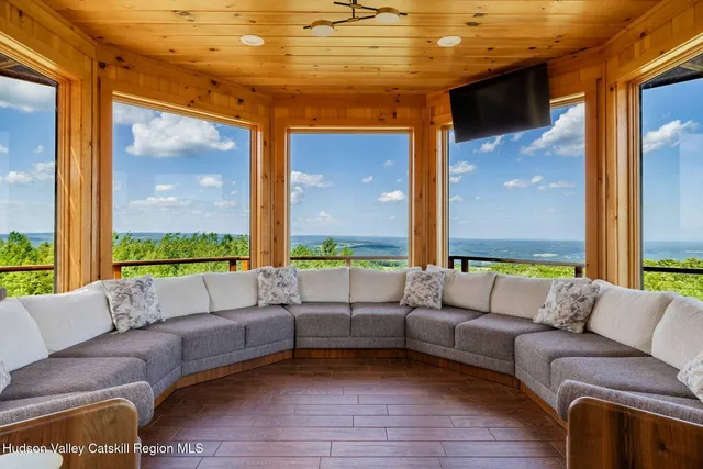 a bathroom with a double vanity sink mirror and shower