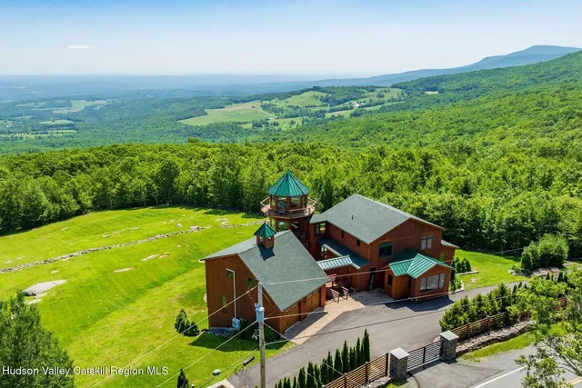 a kitchen with stainless steel appliances granite countertop a stove and a refrigerator