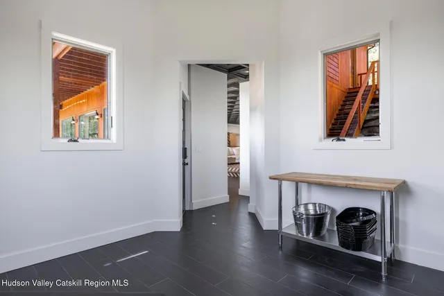 a view of balcony with furniture