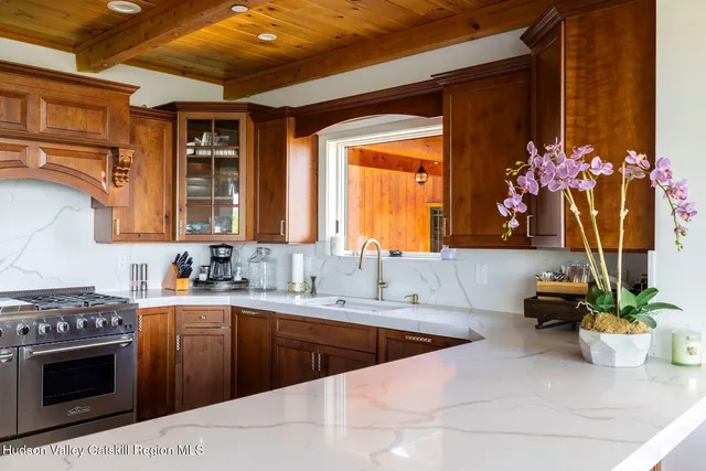 a view of a livingroom with furniture window and outside view
