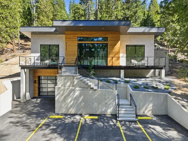a front view of a house with entertaining space