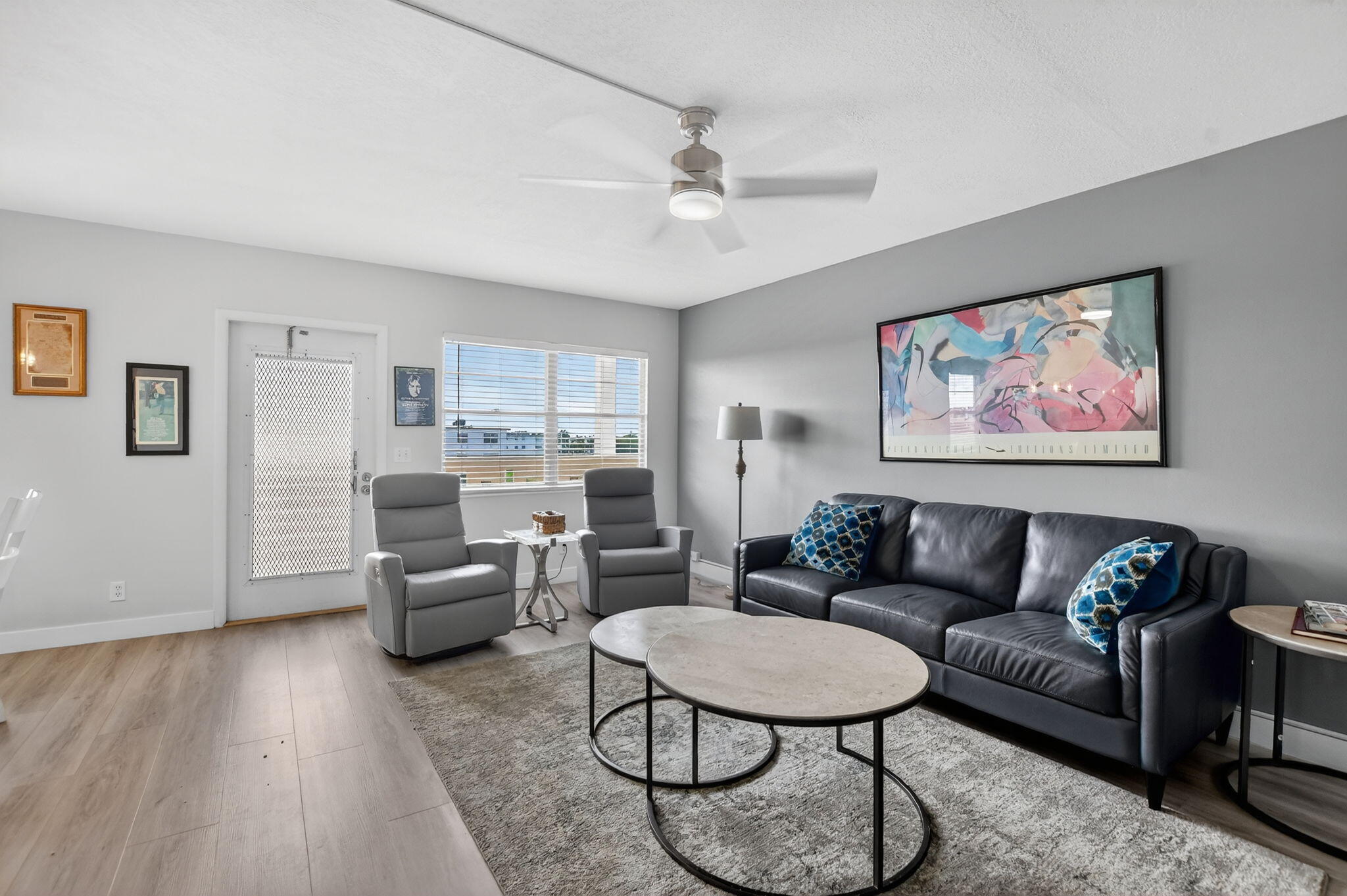 4051 Guilford C Boca Raton, FL 33434 - Photo 11 of 44 a living room with furniture and a large window
