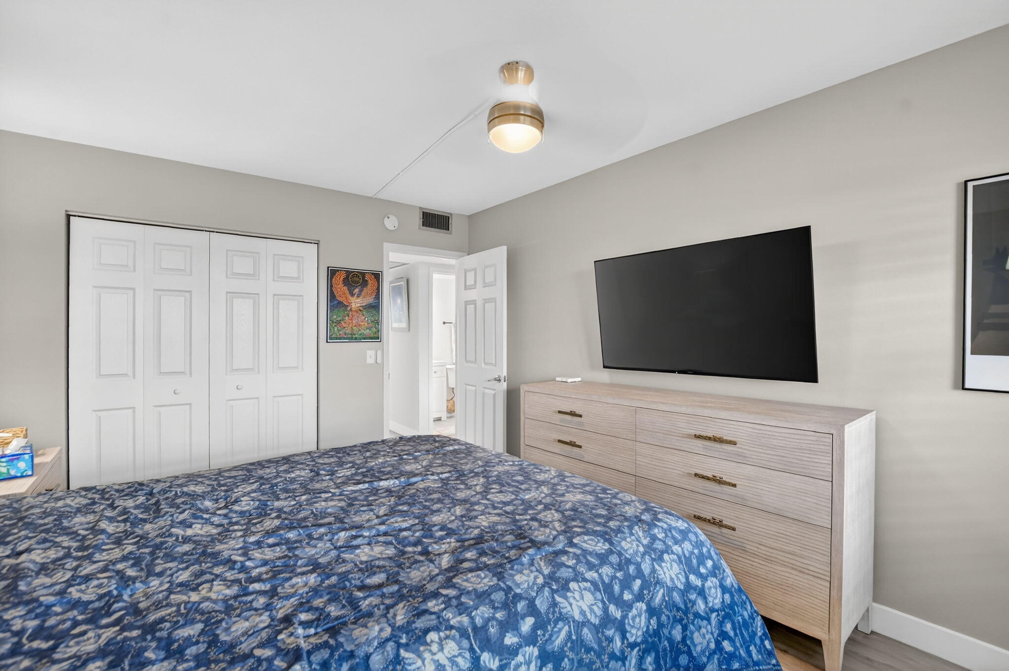 4051 Guilford C Boca Raton, FL 33434 - Photo 15 of 44 a bedroom with a bed and a flat screen tv