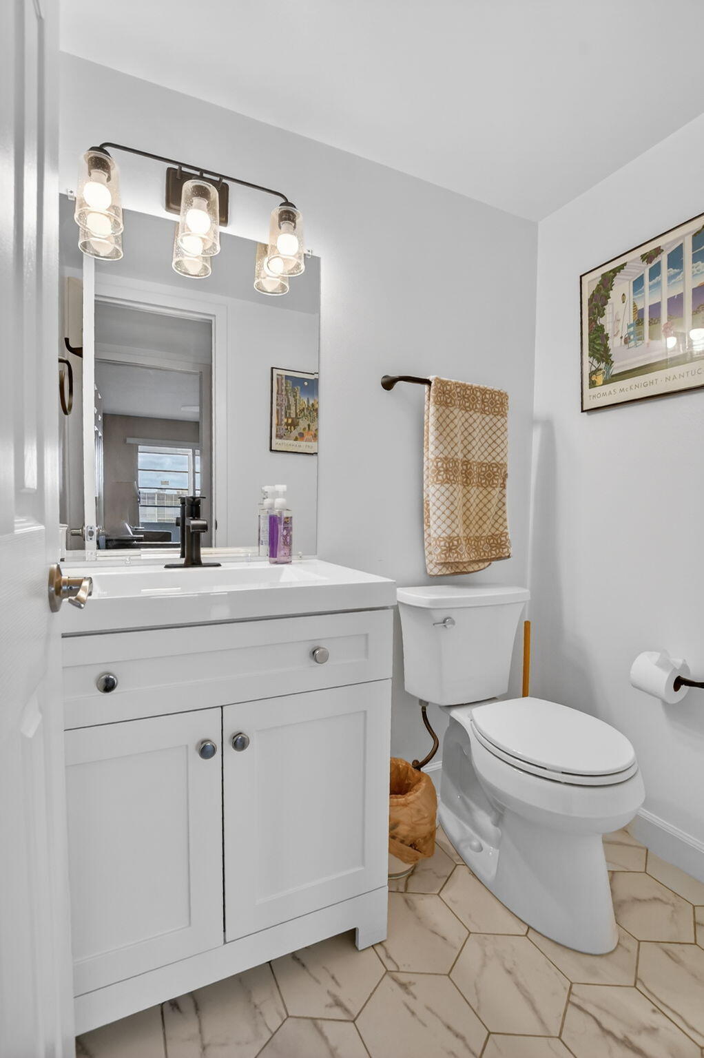 4051 Guilford C Boca Raton, FL 33434 - Photo 20 of 44 a bathroom with a sink toilet and mirror