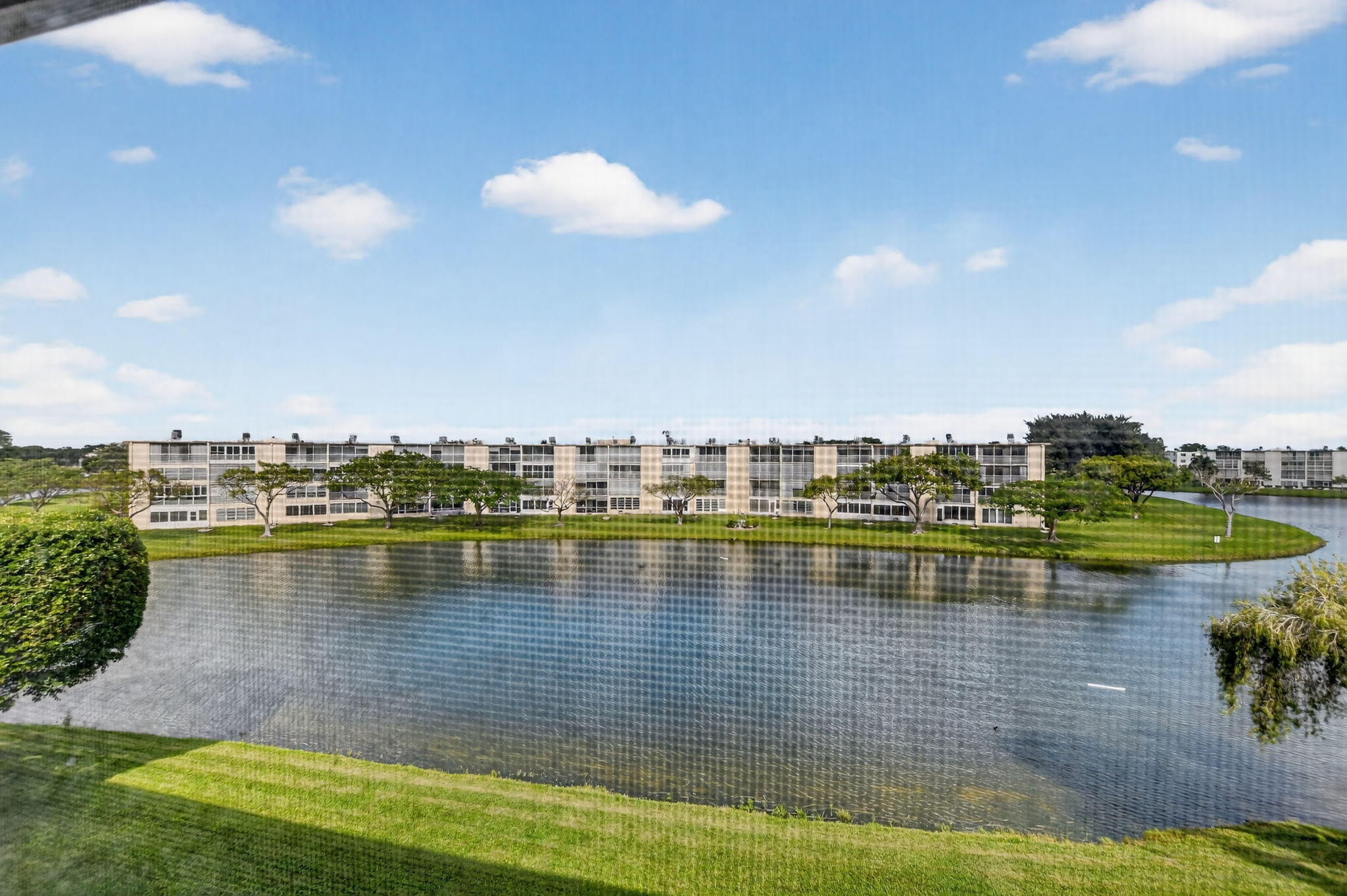 4051 Guilford C Boca Raton, FL 33434 - Photo 24 of 44 a view of a lake view