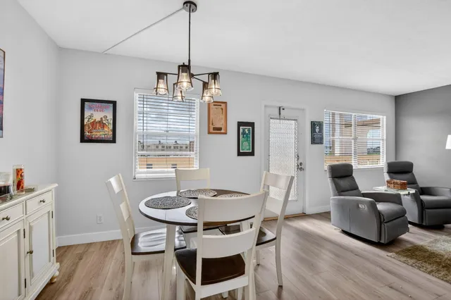 a view of a livingroom with furniture and window
