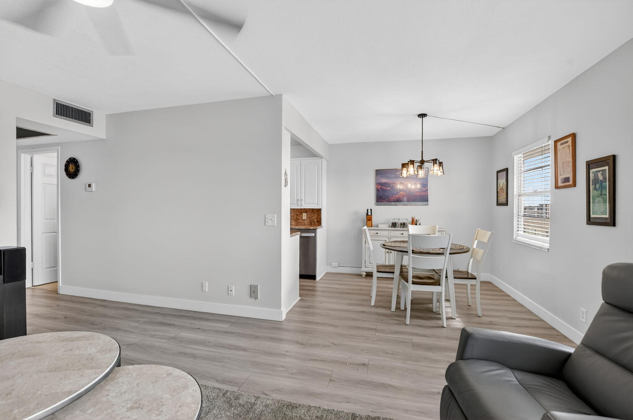 4051 Guilford C Boca Raton, FL 33434 - Photo 10 of 44 a living room with furniture and a wooden floor