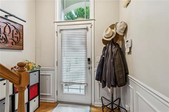 a view of entryway with wooden floor