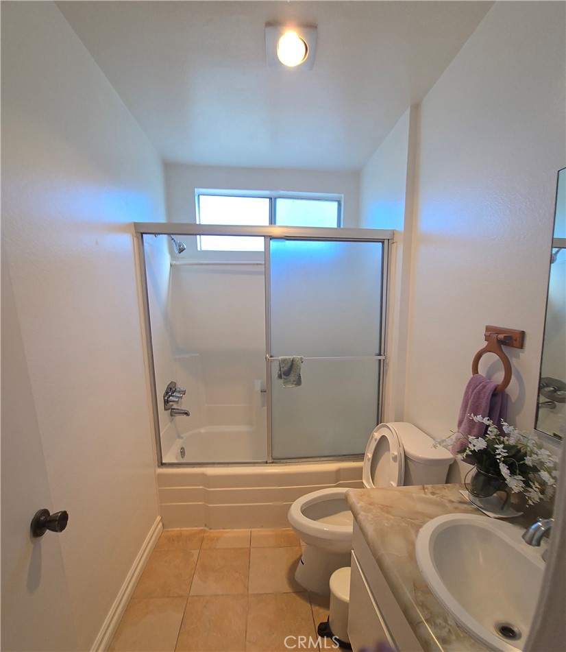 12157 Moorpark Street, Unit 206 Studio City, CA 91604 - Photo 8 of 17 a bathroom with a sink toilet and shower