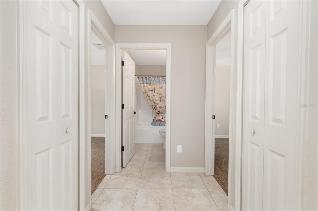2 Hemlock Loop Drive Ocala, FL 34472 - Photo 20 of 28 a view of a bathroom with a glass door