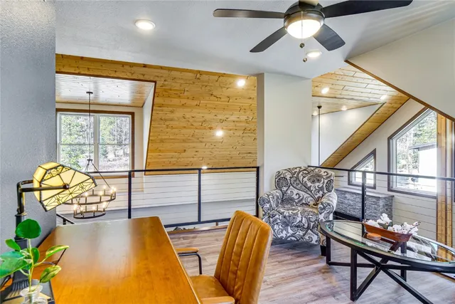 a view of room with wooden floor and cabinet