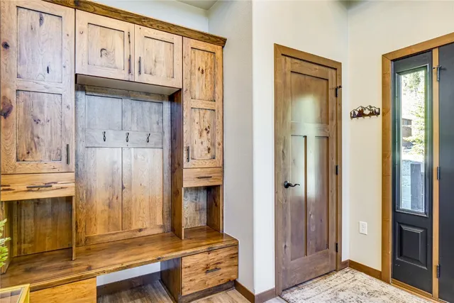 a view of a house with pool and sitting area