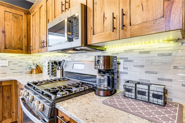 a bedroom with a bed and a cabinets