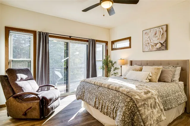 a bedroom with a bed and walk in closet