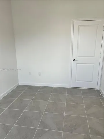 a bathroom with a sink vanity and a mirror
