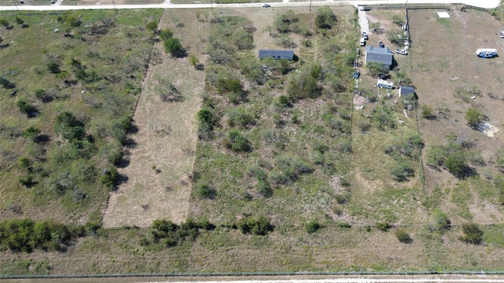 Lot 24 Baron Acres Road Wortham, TX 76693 - Photo 6 of 9 an aerial view of a house with a yard