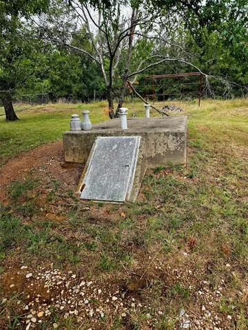 a view of a yard with an outdoor space