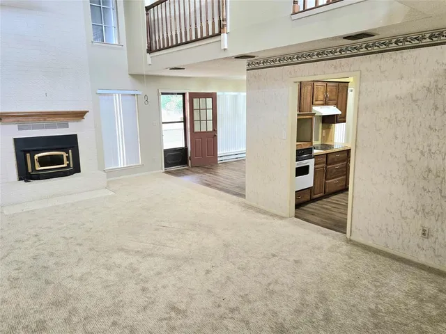 a view of a livingroom with a fireplace
