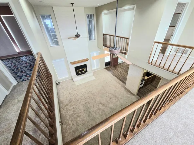 a view of living room and wooden floor
