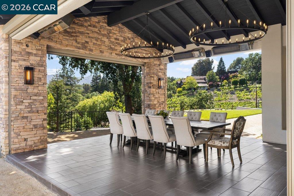 640 El Pintado Road Danville, CA 94526 - Photo 24 of 60 a view of a patio with table and chairs and potted plants