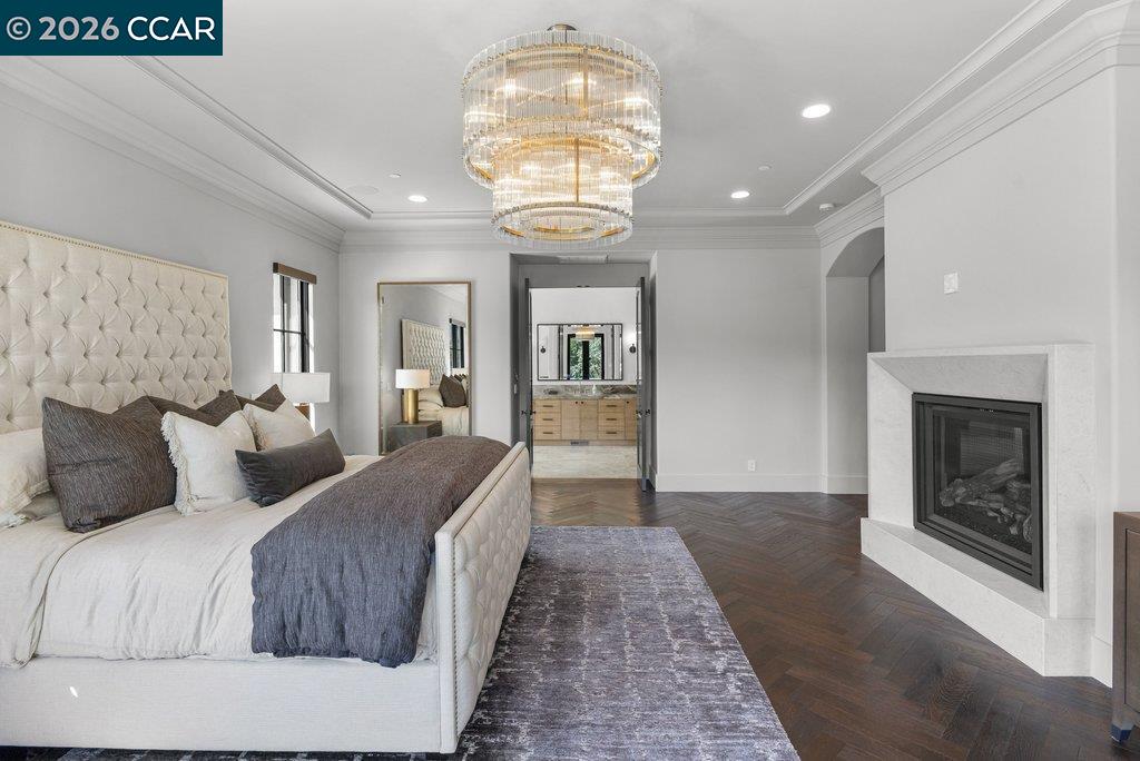 640 El Pintado Road Danville, CA 94526 - Photo 26 of 60 a spacious bedroom with a bed and a fireplace