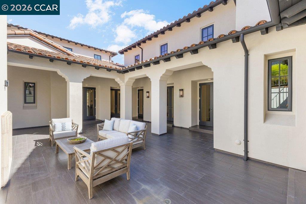 640 El Pintado Road Danville, CA 94526 - Photo 39 of 60 a view of a patio with couches chairs and wooden floor