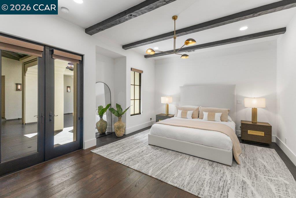 640 El Pintado Road Danville, CA 94526 - Photo 43 of 60 a bedroom with a bed and wooden floor