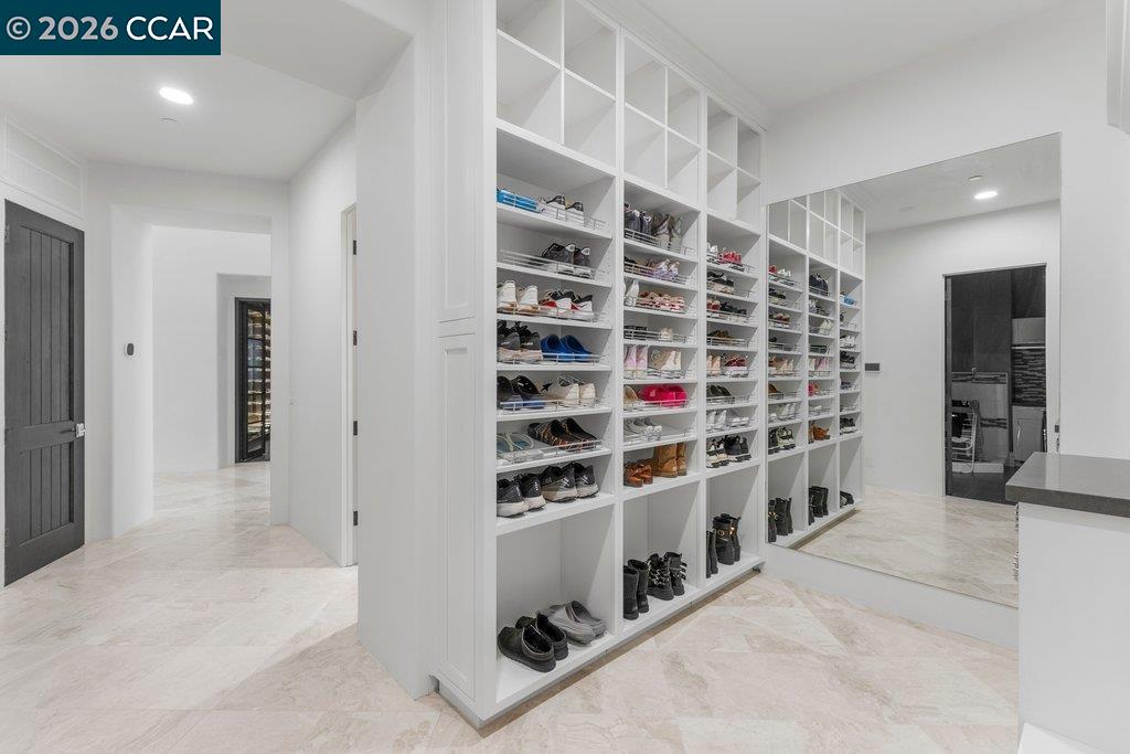 640 El Pintado Road Danville, CA 94526 - Photo 47 of 60 a view of walk in closet with empty racks