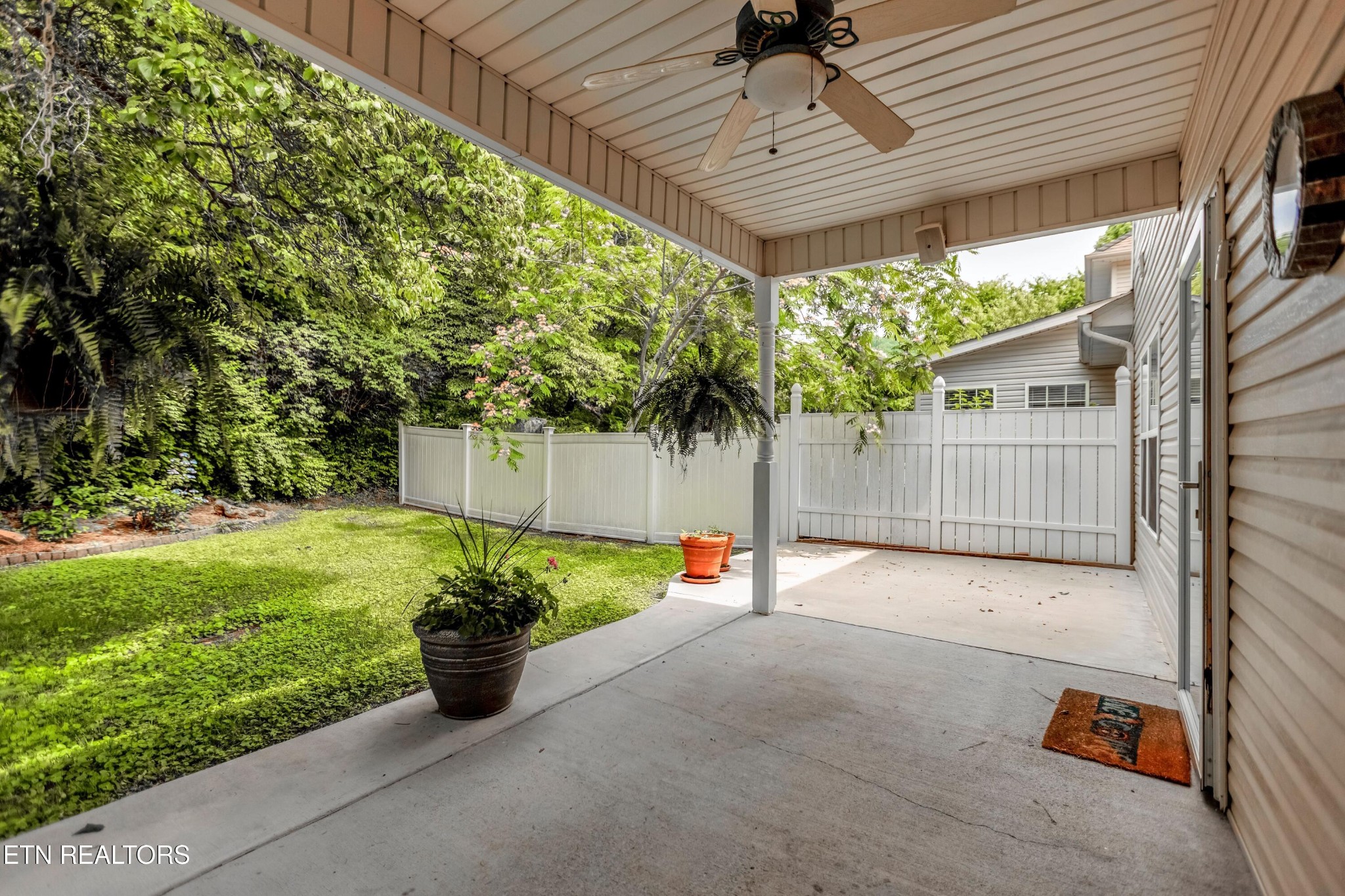 7204 Oakfield Lane Powell, TN 37849 - Photo 38 of 43 a view of a backyard with plants and a garden