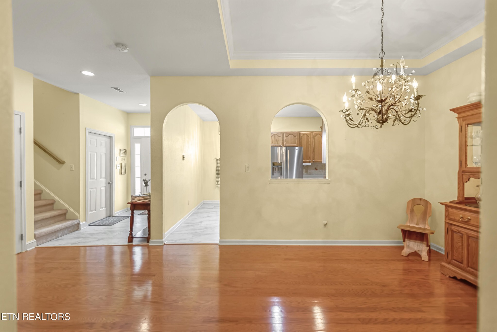 7204 Oakfield Lane Powell, TN 37849 - Photo 5 of 43 a view of a room with wooden floor and furniture