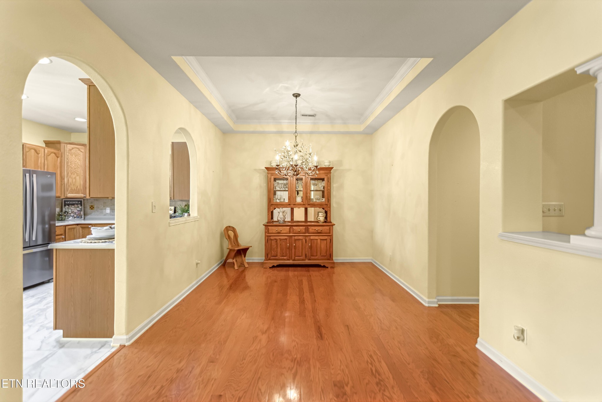 7204 Oakfield Lane Powell, TN 37849 - Photo 6 of 43 a view of a room with wooden floor and a window