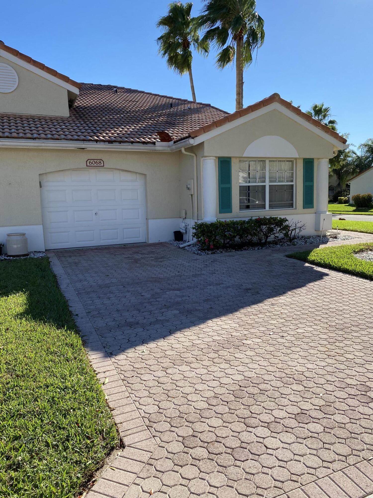 6068 Caladium Road Delray Beach, FL 33484 - Photo 1 of 29 EXTERIOR FRONT