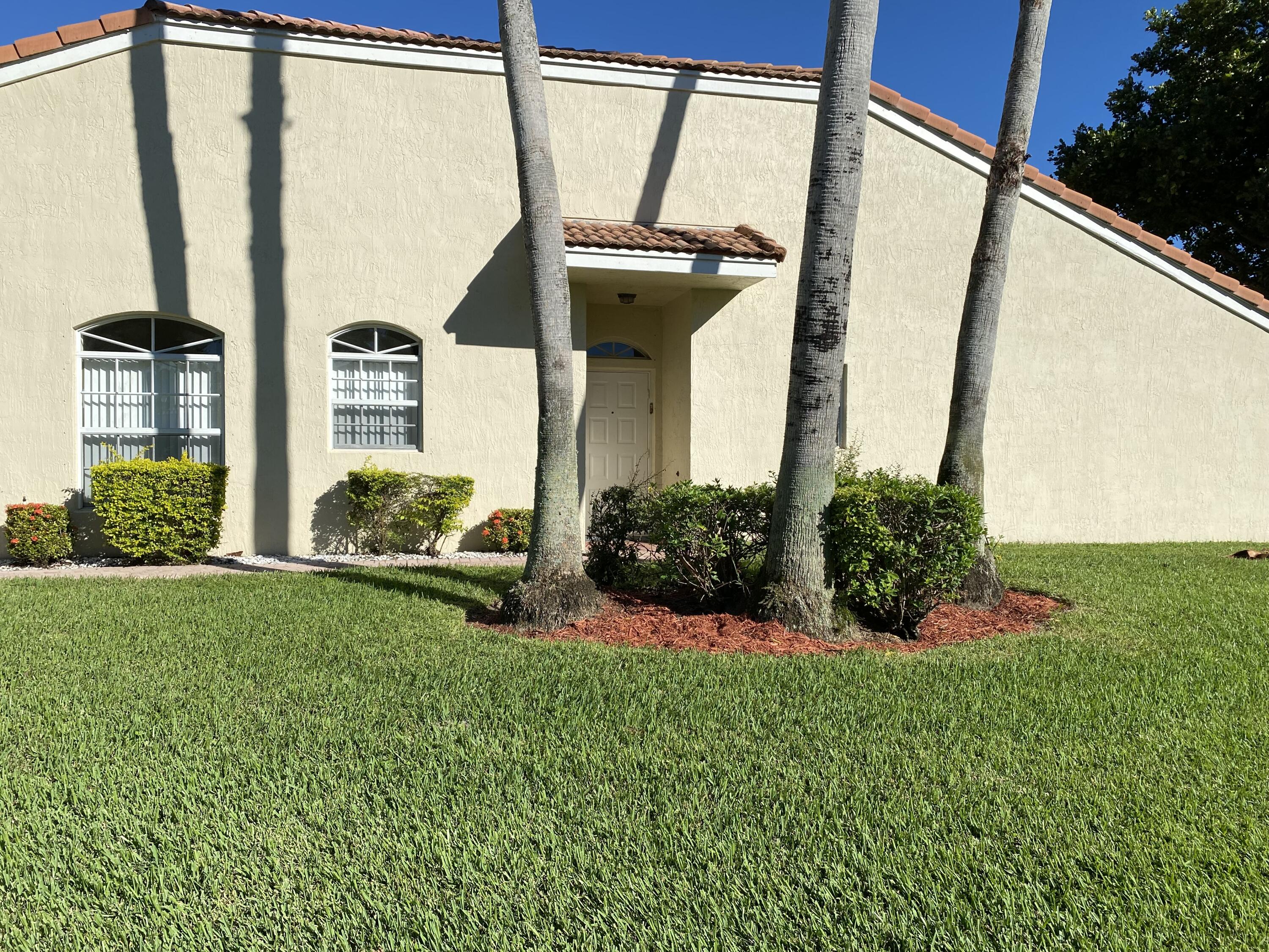 6068 Caladium Road Delray Beach, FL 33484 - Photo 3 of 29 LANDSCAPING