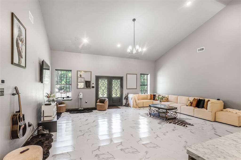 1373 George Ephram Cord 166 Road Overton, TX 75684 - Photo 5 of 40 Vaulted ceiling with an attached chandelier and recessed lighting