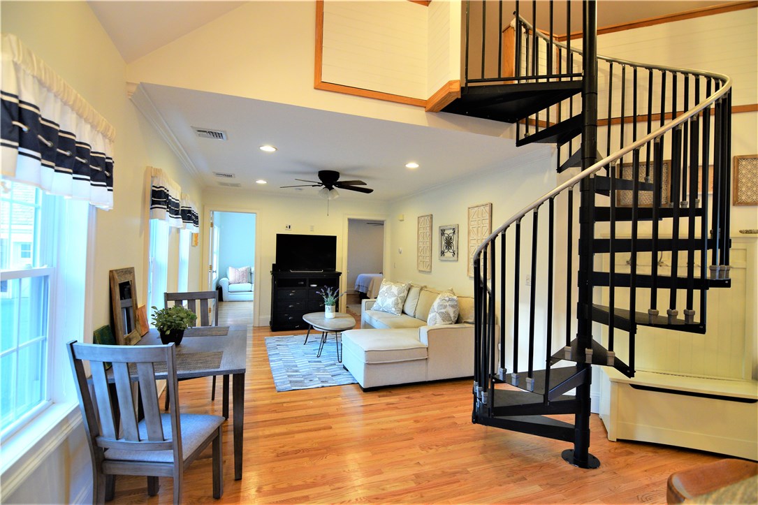 26 Phelps Road Middletown, RI 02842 - Photo 22 of 27 A space safer, the spiral stairs lead to the loft and additional attic storage.