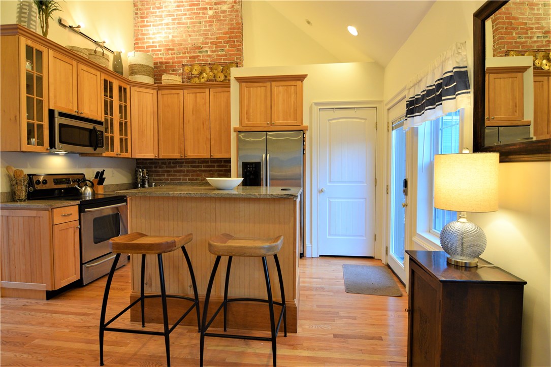 26 Phelps Road Middletown, RI 02842 - Photo 7 of 27 Cathedral ceiling create a a greater sense of space.