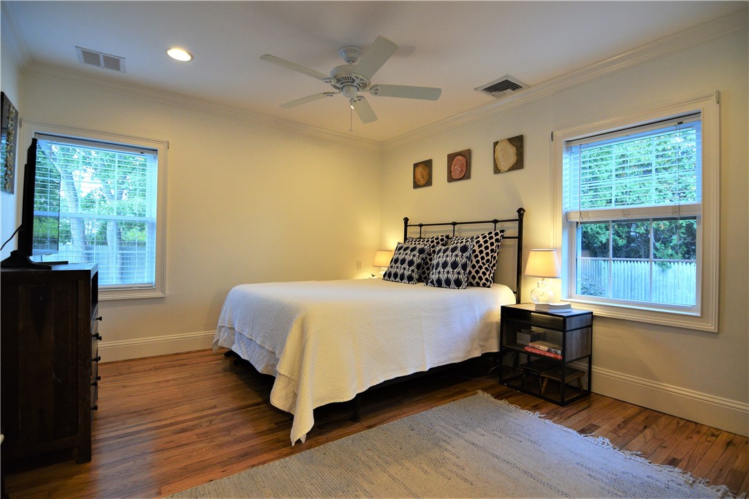 26 Phelps Road Middletown, RI 02842 - Photo 10 of 27 The principal bedroom overlooks the private yard - very quiet.