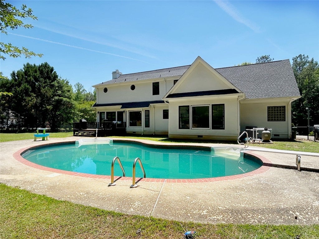2004 Moores Mill Road Lanett, AL 36863 - Photo 6 of 50 This spacious residence features a private pool, perfect for outdoor enjoyment and relaxation.