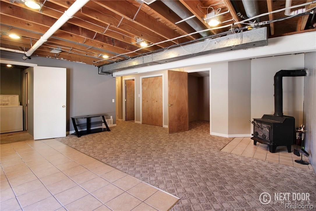 768 Hemingway Road Lake Orion, MI 48362 - Photo 34 of 53 Reverse View of Lower Level Rec Room Walkout