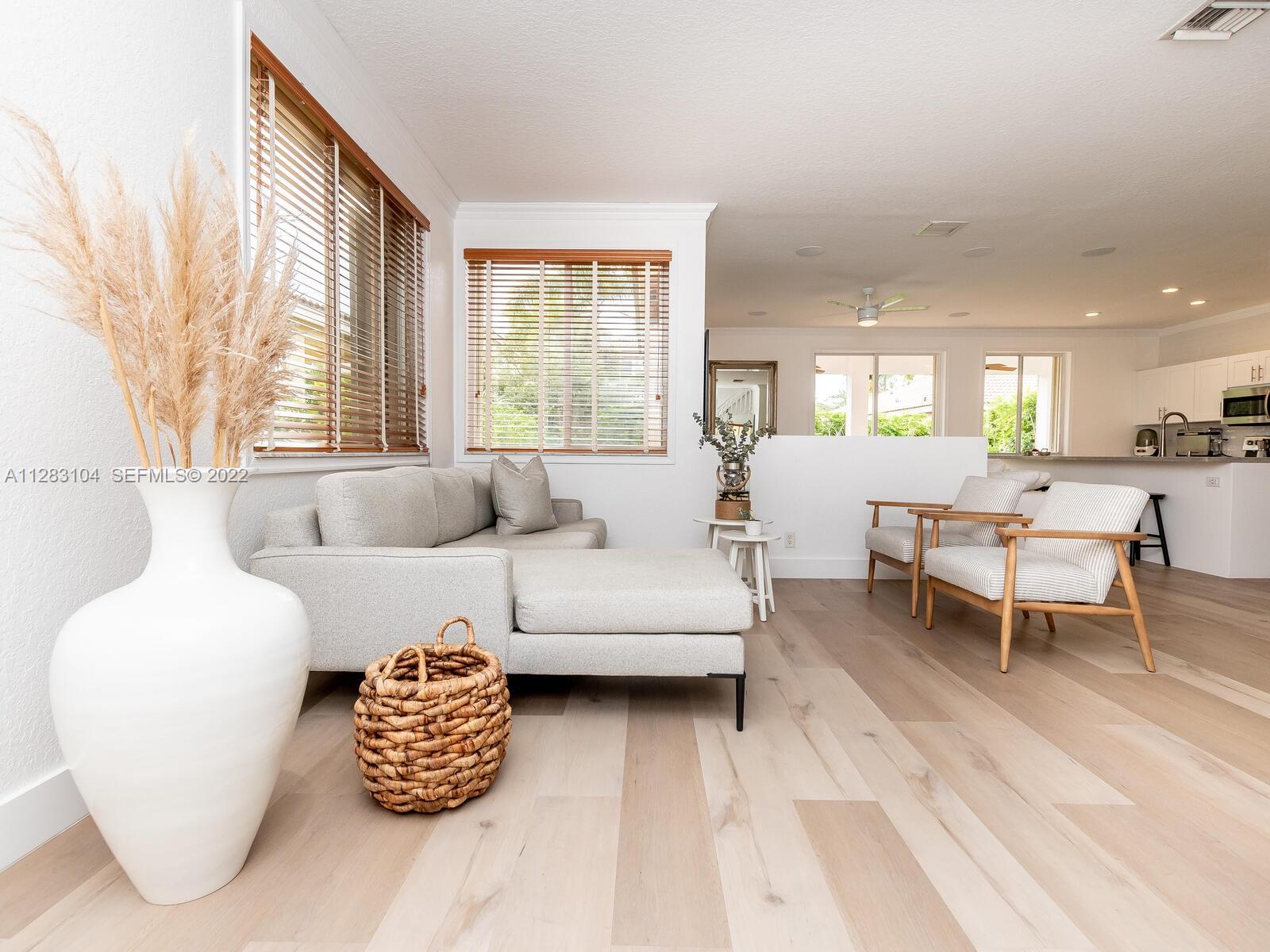 471 Fishtail Terrace Weston, FL 33327 - Photo 15 of 64 a living room with furniture and a large window