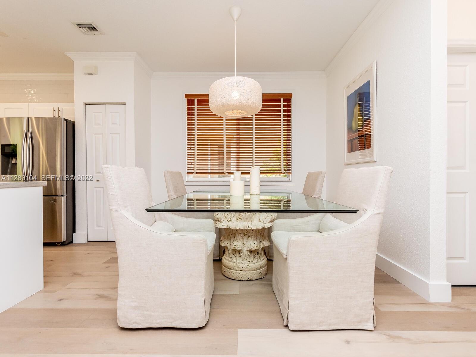 471 Fishtail Terrace Weston, FL 33327 - Photo 18 of 64 a kitchen with stainless steel appliances granite countertop a sink and a refrigerator