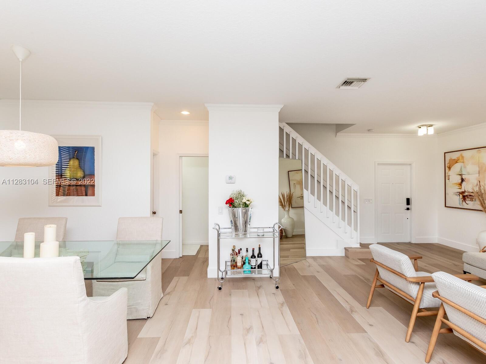 471 Fishtail Terrace Weston, FL 33327 - Photo 21 of 64 a living room with furniture and a table