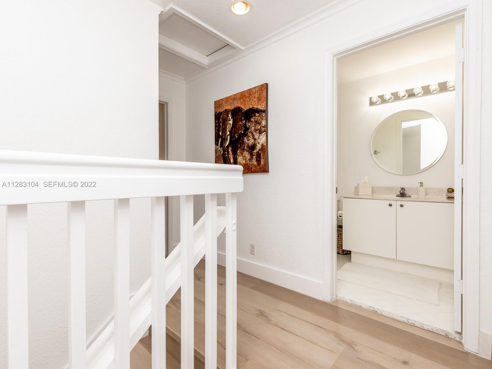 471 Fishtail Terrace Weston, FL 33327 - Photo 29 of 64 a bathroom with a sink mirror and vanity