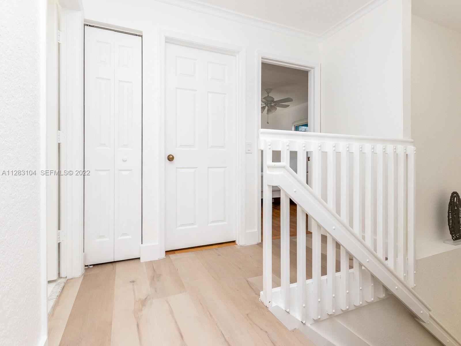 471 Fishtail Terrace Weston, FL 33327 - Photo 30 of 64 a view of a hallway with staircase