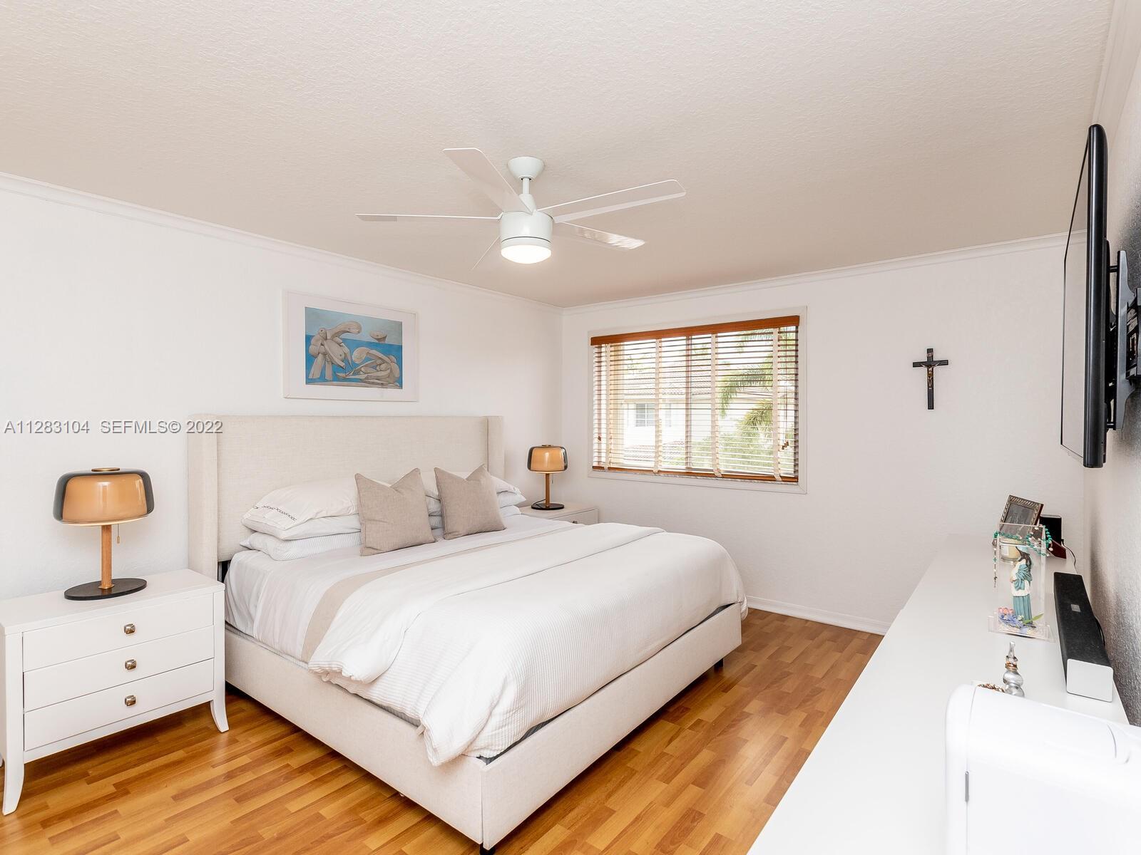 471 Fishtail Terrace Weston, FL 33327 - Photo 33 of 64 a bedroom with a bed and window