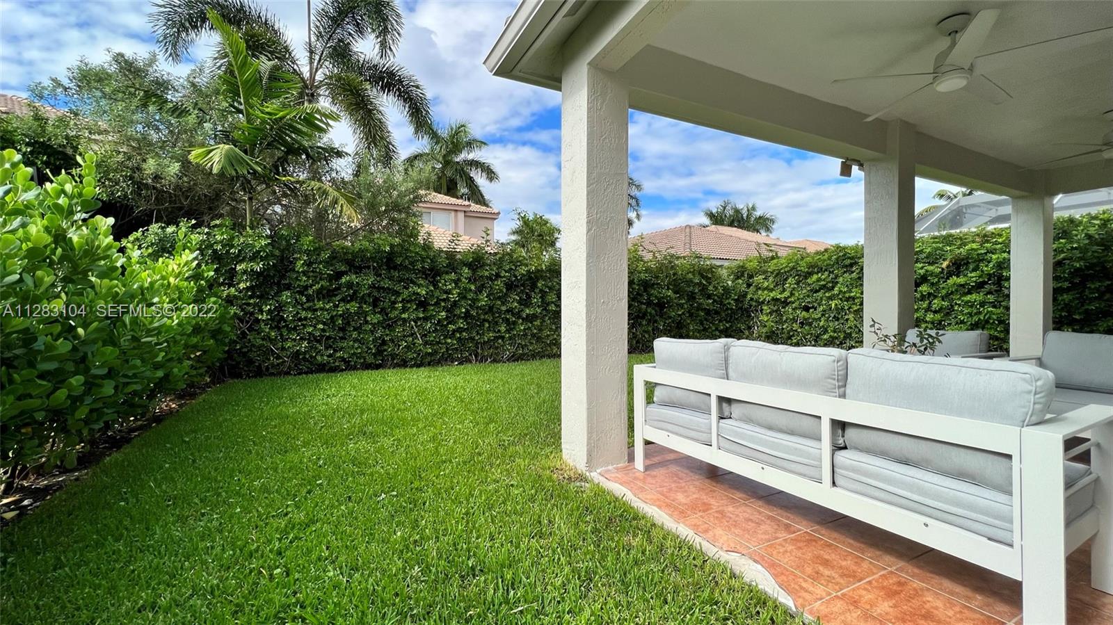471 Fishtail Terrace Weston, FL 33327 - Photo 55 of 64 a view of backyard with green space