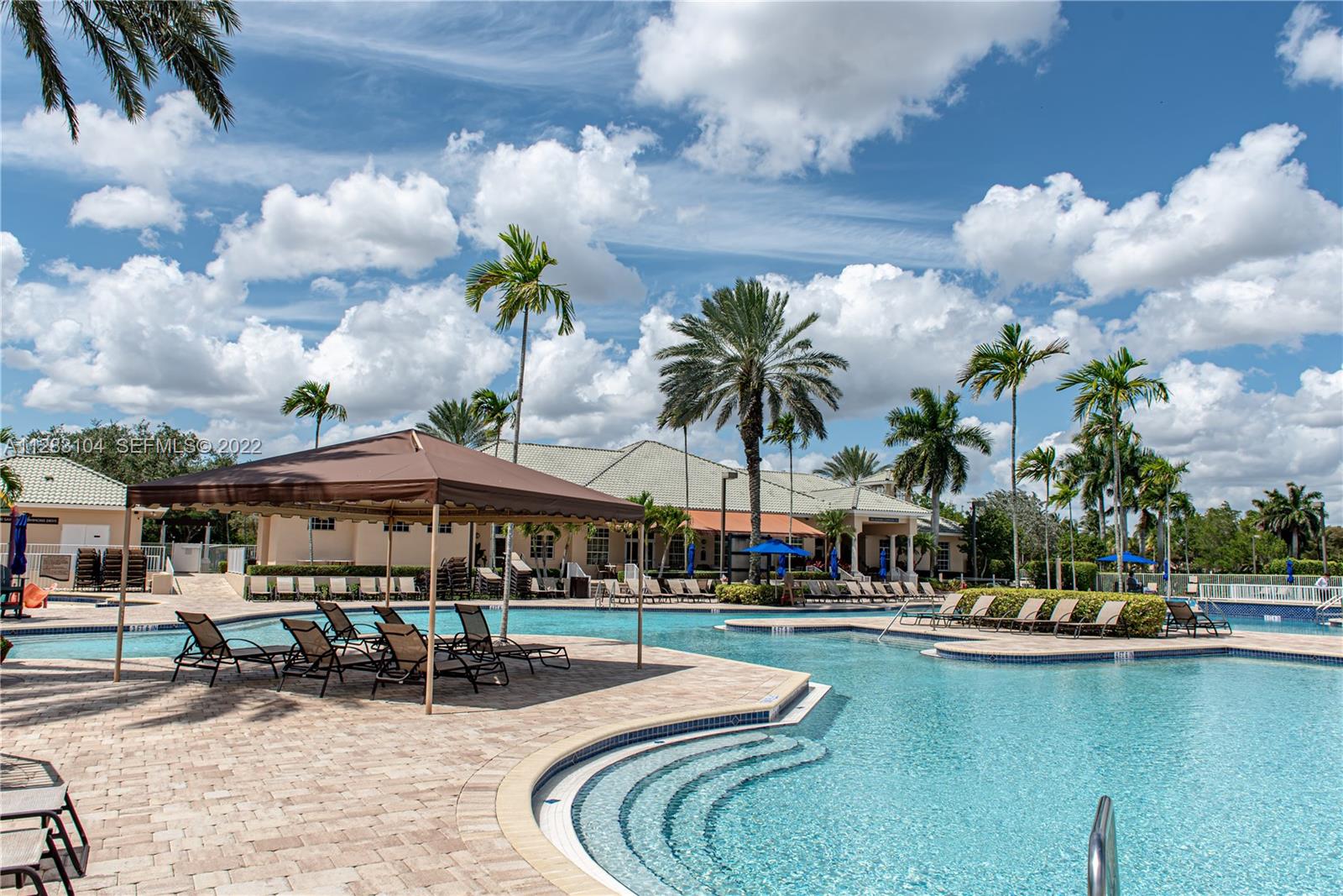 471 Fishtail Terrace Weston, FL 33327 - Photo 64 of 64 a view of swimming pool with outdoor seating